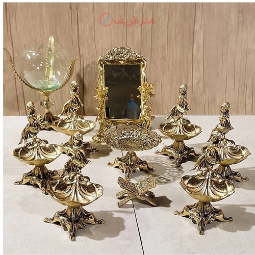 خرید آنلاین، هفت سین برنزی طرح دختربچه نشسته و بال فرشته، بی نظیر و با کیفیت، زیر قیمت بازار | هنرظریف