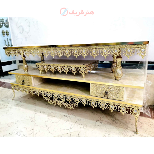 خرید، قیمت و مشخصات میز تلویزیون برنزی صفحه هایگلاس مدل گل آفتابگردان، سه طبقه، دارای ضمانت ارزان و باکیفیت _ هنرظریف