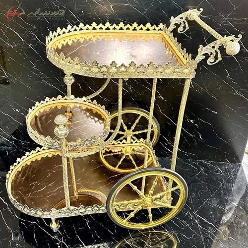 خرید آنلاین، میز بار برنزی با طرح دسته توت فرنگی، سه طبقه آینه ای، رنگ طلایی بسیار با کیفیت اعلاء، با قیمت بسیار مناسب | هنرظریف