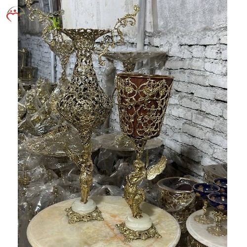 خرید آنلاین، ست گلدان و سطل ایستاده برنزی با ستون هایی در طرح فرشته بالدار، پر نقش با کیفیت عالی همراه ضمانت، زیر قیمت بازار | هنرظریف