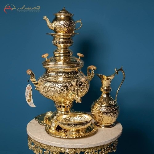 خرید آنلاین، سماور برنجی طلایی رنگ در طرح گل مرغ، پر نقش و زیبا همراه با 5 سال ضمانت نامه، زیر قیمت بازار | هنرظریف