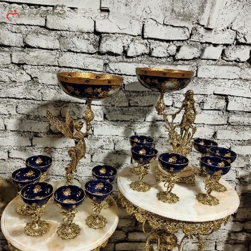 خرید آنلاین، هفت سین فوق زیبای برنجی دارای پایه هایی با طرح فرشته بالدار و کاسه های سرمه ای با نقش و نگار ظریف، با قیمت مناسب | هنرظریف