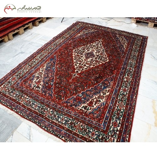 خرید آنلاین، فرش دستبافت همدان 40 ساله کد 39423 با زمینه لاکی و حاشیه کرم، نقش لچک و ترنج و دارای ضمانت، با قیمت مناسب | هنرظریف