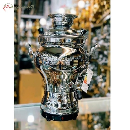 خرید، قیمت و مشخصات سماور برنجی برقی 6 لیتری دارای سیستم برق کم مصرف و ایمن با بدنه ی برنجی روکش دار و مقاوم، مدل کلاسیک و ورق ضخیم، زیر قیمت بازار | هنرظریف