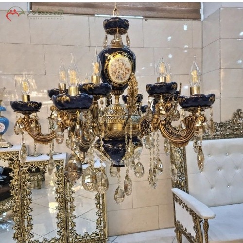 خرید، قیمت و مشخصات لوستر 12 شعله با بدنه ی برنزی پر کار با کیفیت ساخت بی نظیر، ترکیب شده با رنگ با سرامیک سرمه ای و رنگ ثابت، زیر قیمت بازار | هنرظریف