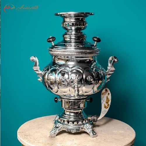 خرید آنلاین، سماور گازی برنجی با بدنه آبکاری و کار شده در طرح عدسی با 15 ماه ضمانت، ساده و شیک، با قیمت مناسب | هنرظریف