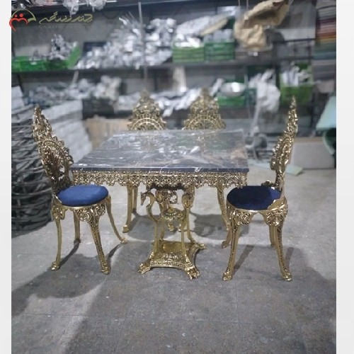 خرید آنلاین، میز ناهار خوری از جنس برنزی مدل پسر بچه و پایه اسبی با صفحه سنگ مشکی، با کیفیت عالی، زیر قیمت عالی | هنرظریف
