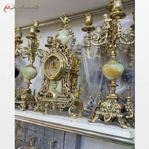 خرید آنلاین، ست ساعت شمعدان برنزی کنت ، رنگ بدنه برنزی سیاه قلم، سنگ خوش رنگ اعلاء، ضمانت رنگ، زیر قیمت بازار | هنرظریف
