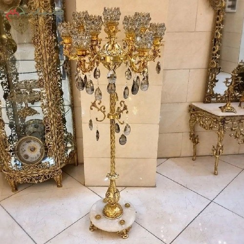 خری آنلاین، کنار سالنی برنزی دارای 11 شعله با رنگ آبکاری شده و 60 ماه ضمانت رنگ، پر نقش، زیر قیمت بازار | هنرظریف