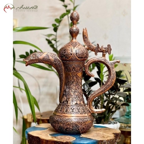 خرید آنلاین، دله قهوه عربی برنجی در طرح چهره، با قلم زنی فوق العاده در رنگ مسی، دارای گارانتی، زیر قیمت بازار | هنرظریف