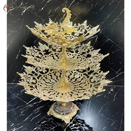 خرید آنلاین،ظرف میوه خوری سه طبقه برنزی اسلیمی با پایه سنگی طرح برگ ریز برجسته طلایی رنگ، زیر قیمت بازار | هنرظریف