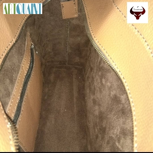 کیف چرمی مجلسی زنانه تهیه شده از چرم گاوی فلوتر و دوخته شده با نخ موم زده ایتالیایی