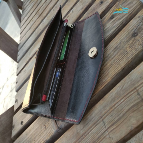 کیف دستی از چرم طبیعی گاوی، دوخته شده با نخ موم زده ترک