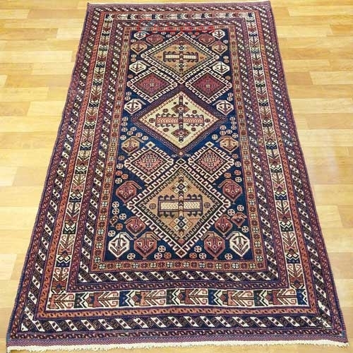 فرش دستباف آنتیک افشار سیرجان طرح ۳ ترنج سایز قاليچه رنگ زمینه سرمه اي رنگ حاشیه كرم کد ۳۹۴۹۱ - هنرظریف