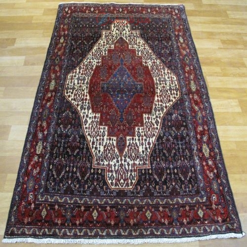 فرش دستباف سنندج طرح لچک و ترنج سایز قاليچه رنگ زمینه كرم رنگ حاشیه لاكي کد ۳۹۸۵۱ - هنرظریف