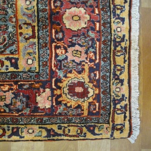فرش دستباف بيجار طرح ترنجي ماهي سایز قالي رنگ زمینه رناسي رنگ حاشیه سرمه اي کد ۴۰۰۱۴