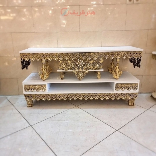 میز تلویزیون رویه ام دی اف، جنس آلیاژ، با طرح جدید و زیبا، رنگ ثابت و کیفیت درجه 1 - هنرظریف