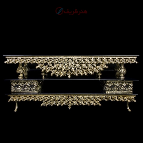 میز تلویزیون منحنی طرح یاس تاجدار، بدنه آلومینیوم و رنگ طلایی