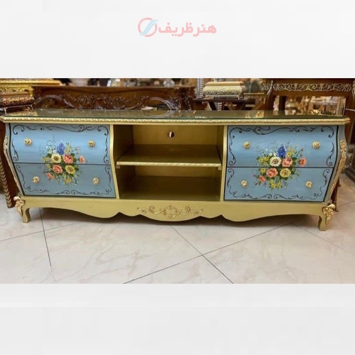 میز تلویزیون معرق کاری با بدنه طراحی شده و رنگ طلایی پولیشی، دارای گارانتی رنگ - هنرظریف