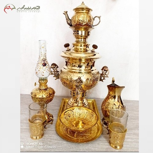ست 8 پارچه سماور ذغالی 4 لیتری تبریز، در طرح شیر با قلمزنی عالی در دو رنگ طلایی و آنتیک، دارای ضمانت