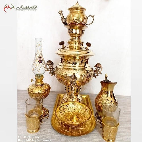 ست 8 پارچه سماور ذغالی 4 لیتری تبریز، در طرح شیر با قلمزنی عالی در دو رنگ طلایی و آنتیک، دارای ضمانت - هنرظریف