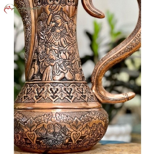 دله قهوه عربی برنجی در طرح چهره، با قلم زنی فوق العاده در رنگ مسی، دارای گارانتی