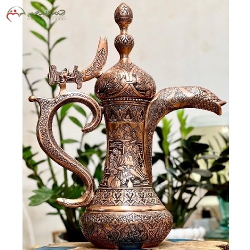 دله قهوه عربی برنجی در طرح چهره، با قلم زنی فوق العاده در رنگ مسی، دارای گارانتی