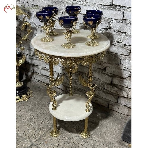 میز برنزی دو طبقه ی طرح فرشته با صفحه سنگی با کیفیت اعلاء بادوام