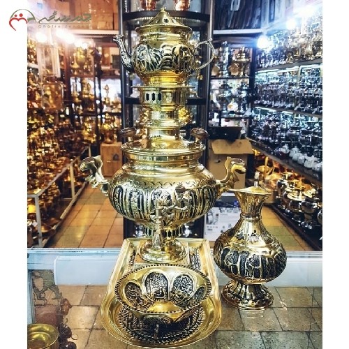 سرویس زیبای سماور ذغالی برنجی کد 116 کار شده با سیاه قلم، رنگ طلایی و عدسی با ضمانت یک ساله