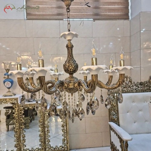 لوستر برنزی پر کار  8 شاخه با سرشاخه سرامیکی، رنگ آنتیک، شکیل و ساده