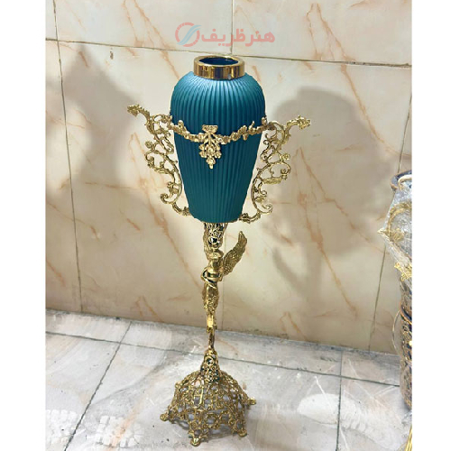 گلدان کنار سالنی برنزی پایه توری فرشته تاج دار