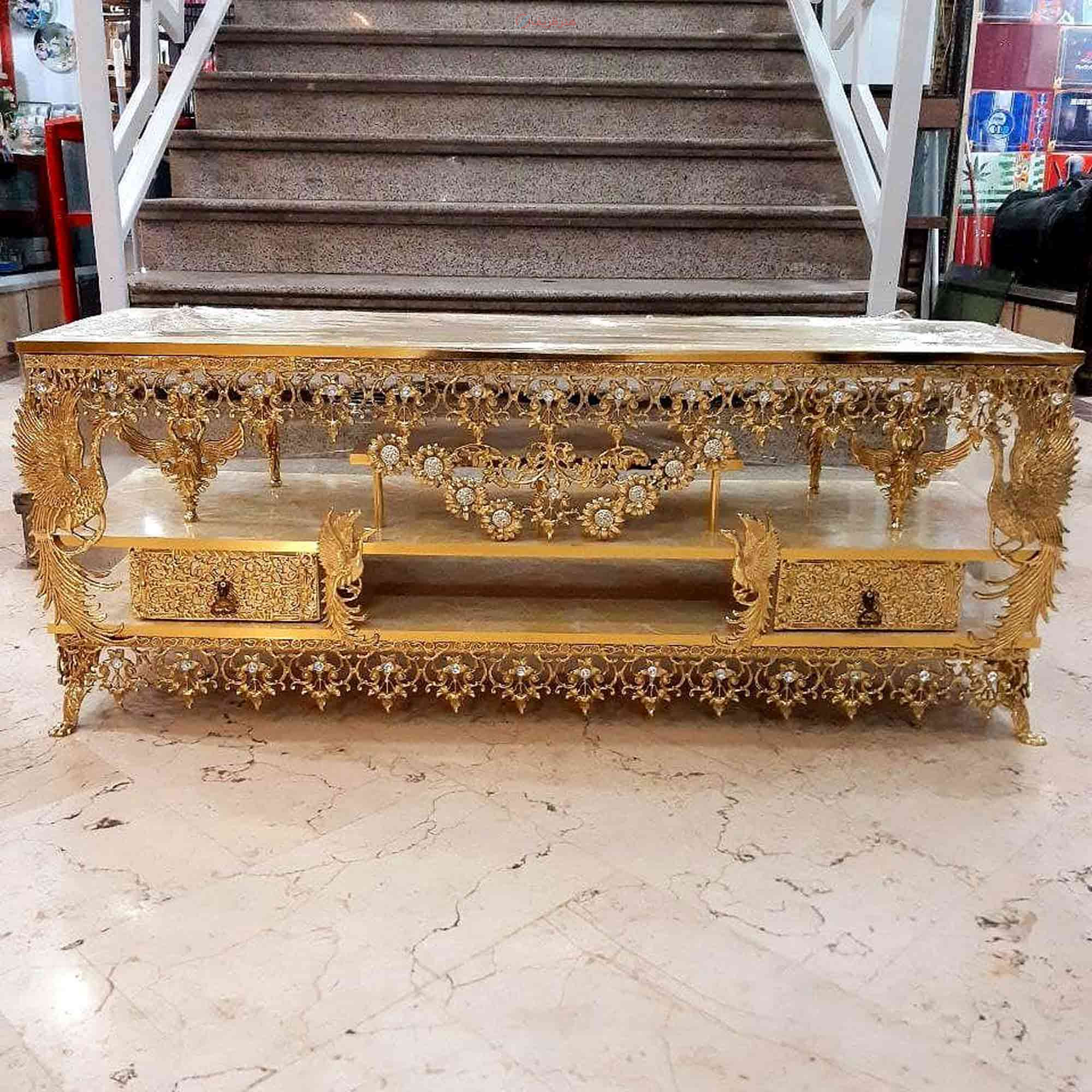 مشخصات میز تلویزیون برنزی صفحه هایگلاس طاوس دار، دارای ضمانت| هنرظریف