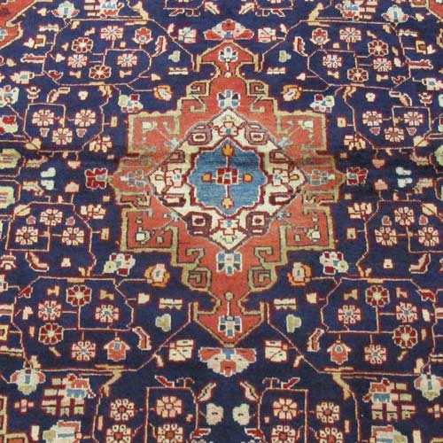 فرش دستباف جوزان ملاير طرح لچک و ترنج سایز ذرع و نيم رنگ زمینه سرمه اي رنگ حاشیه لاكي کد ۳۸۹۳۷