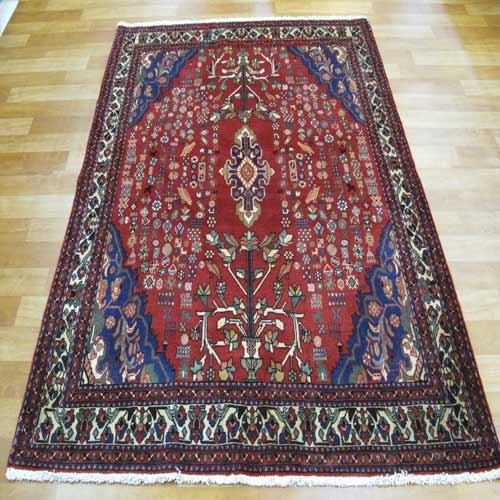 فرش دستباف آباده طرح لچک و ترنج سایز قاليچه رنگ زمینه لاكي رنگ حاشیه كرم کد ۳۸۶۵۸