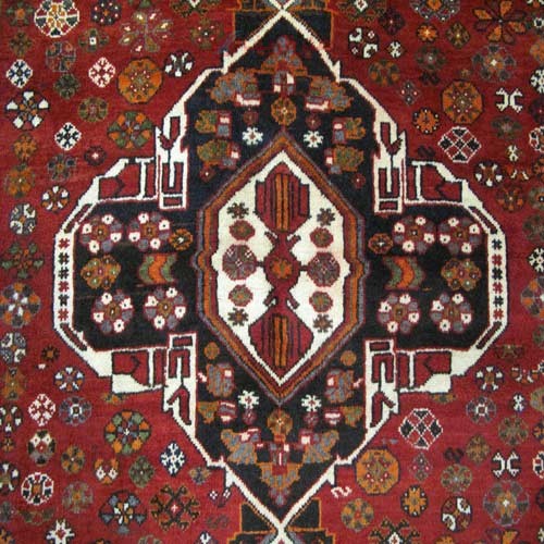 فرش دستباف شيراز طرح لچک و ترنج سایز قاليچه رنگ زمینه لاكي رنگ حاشیه كرم کد ۳۸۶۸۷