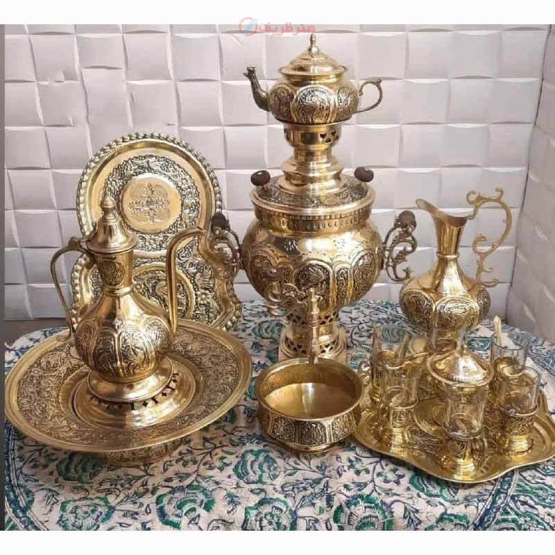 سرویس سماور 7 لیتری برنجی قلم زنی به همراه سرویس چایخوری و آفتابه لگن - هنرظریف