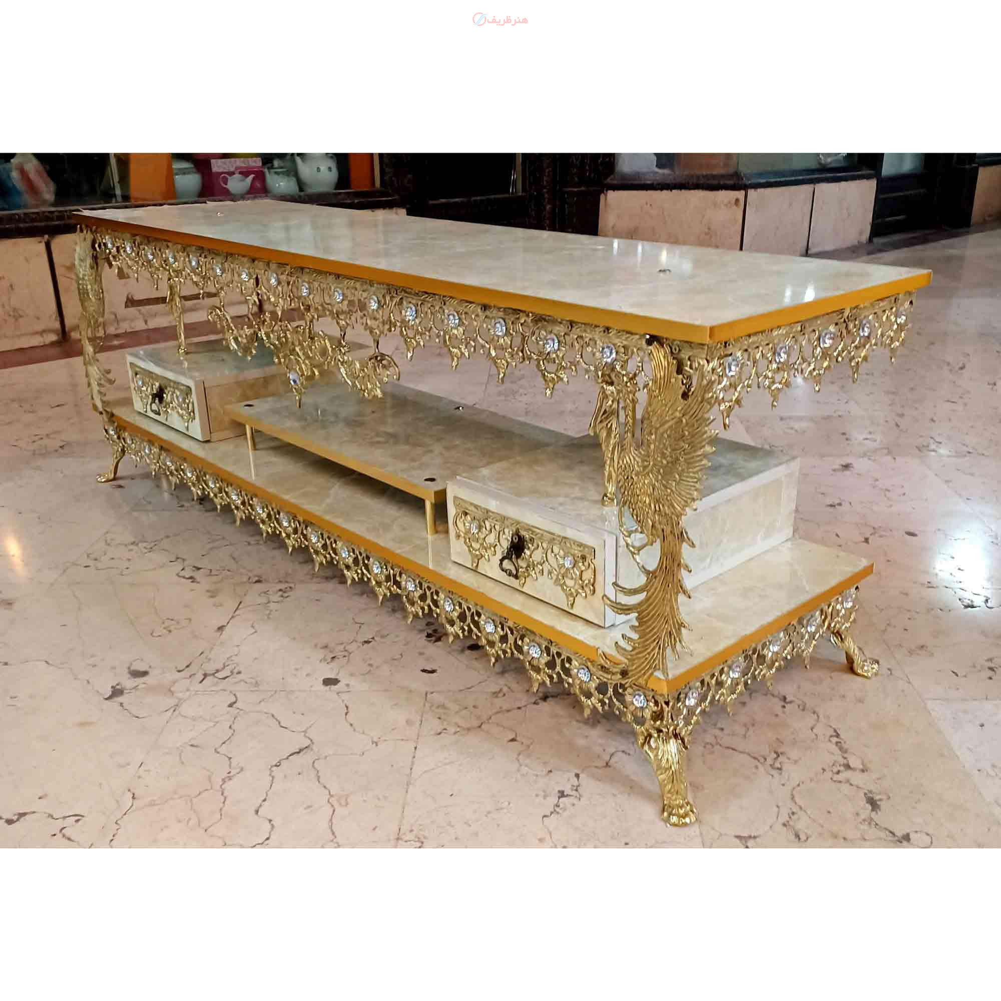 میز تلویزیون طرح طاووس طول 120 جنس آلیاژ آلومینیوم آبکاری برنز