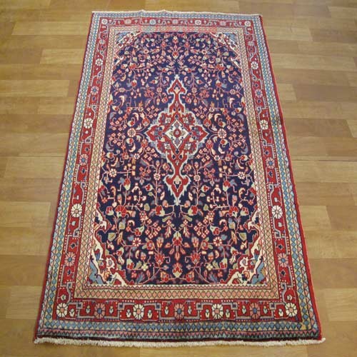 فرش دستباف جوزان ملاير طرح لچک و ترنج سایز ذرع و نيم رنگ زمینه سرمه اي رنگ حاشیه لاكي کد 38940