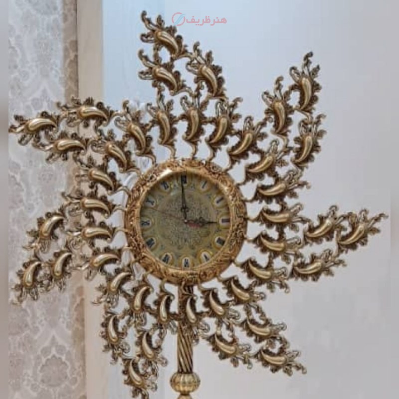 ساعت دیواری طرح فرفره ساخته شده از آلومینیوم با روکش برنز با رنگ ثابت و ماندگار - هنرظریف