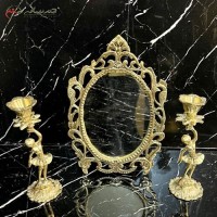 خرید آنلاین، آینه و شمعدان برنزی طلایی بیضی شکل طرح برگ برجسته با شمعدان کوچک، زیر قیمت بازار | هنرظریف